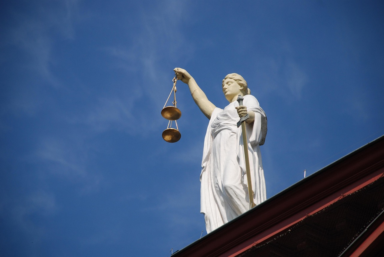 justice scales students teamwork